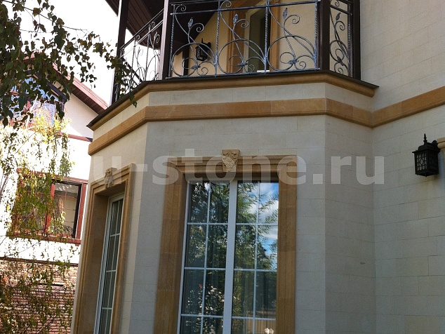 Облицовка дома известняком