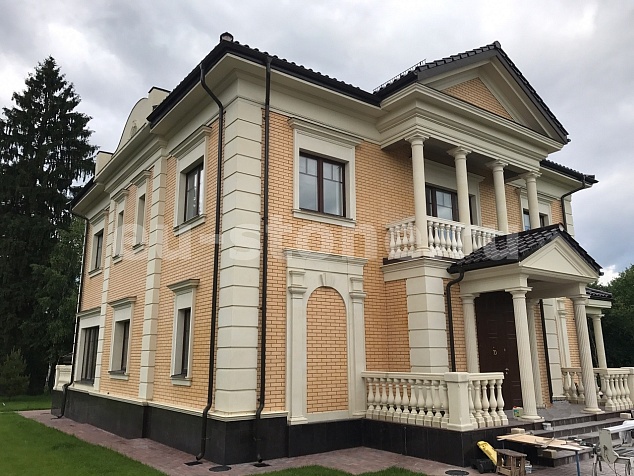 Отделка дома известняком