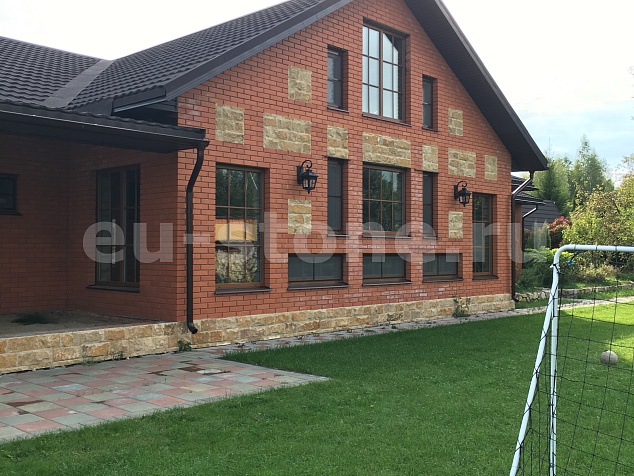 Облицовка фасада доломитом